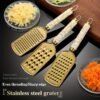 708c6543-e617-4d67-ac33-8aff89d4f80b.jpg Stainless Steel Multi-Purpose Grater Vegetable & Cheese Shredder