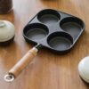 a39cb00d37e74ffebc23a6c6c02209e3-goods.jpeg 4-Cup Cast Iron Egg & Pancake Pan Non-Stick Omelette Skillet